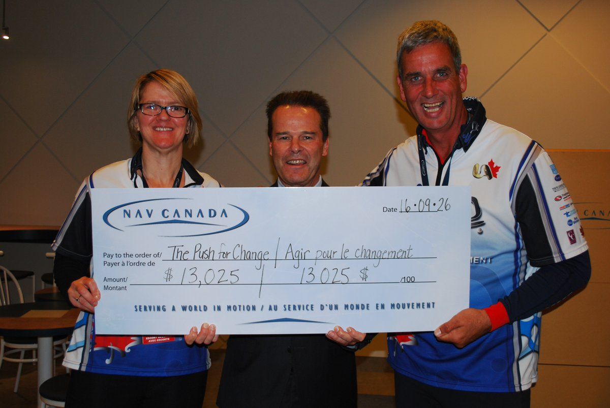 CEO Nav Canada Neil Wilson Presenting Cheque in Ottawa